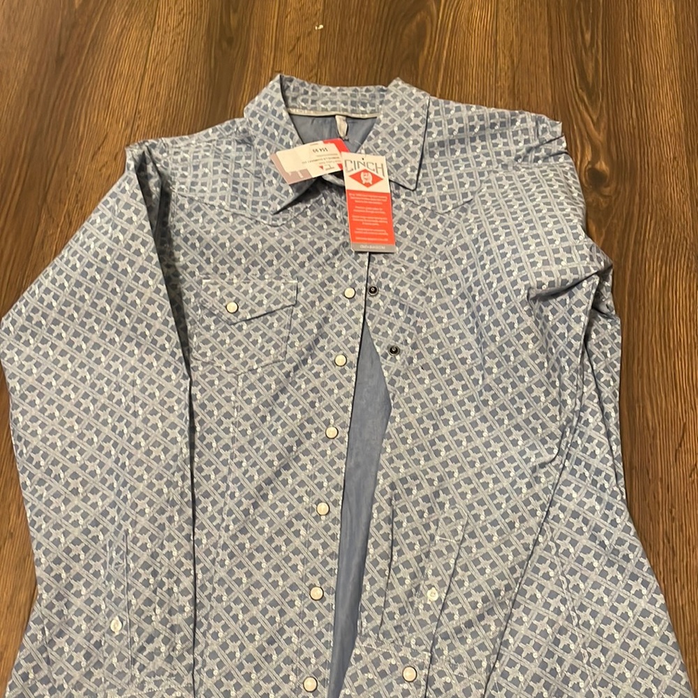New woman’s cinch pearl snap